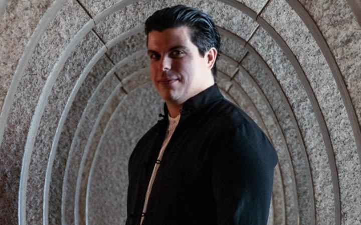 A medium shot of Teatro Regio Music Director Andrea Battistoni.