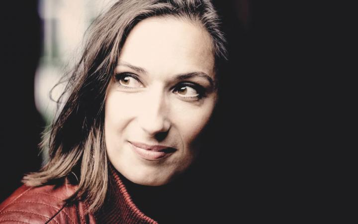 A close-up portrait of conductor Ariane Matiakh.