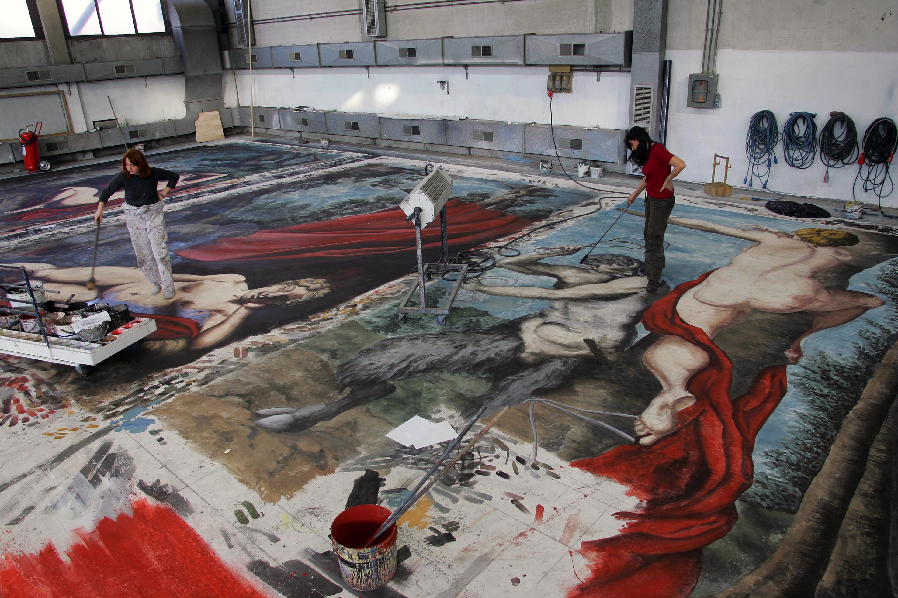 Painting of some backdrops in the sets workshop of the Regio (“Don Giovanni” by Mozart, direction by Michele Placido, sets by Maurizio Balò)