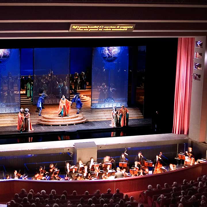 Subtitles display on the proscenium frame